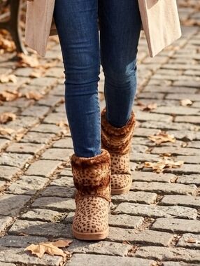 Brown leopard print bear paw style boots